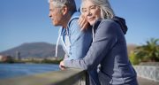 Senior couple in sportswear enjoying the sun outdoors